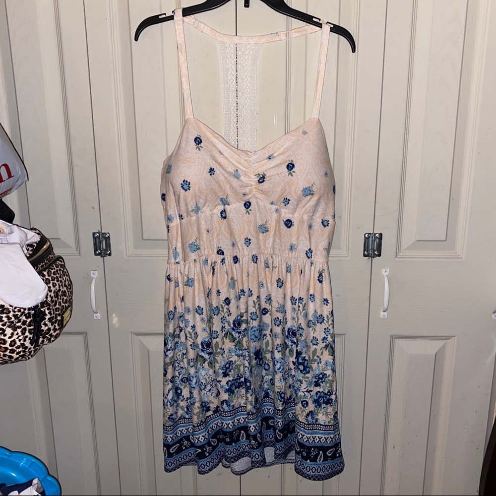 Light pink flowy dress with blue flowers